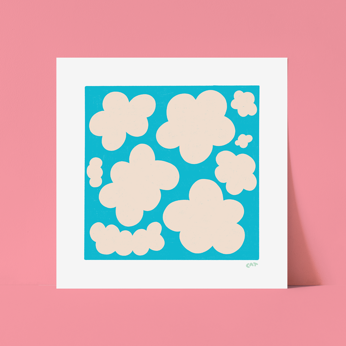 White unframed print of a blue square with white cloud-like shapes on top.
