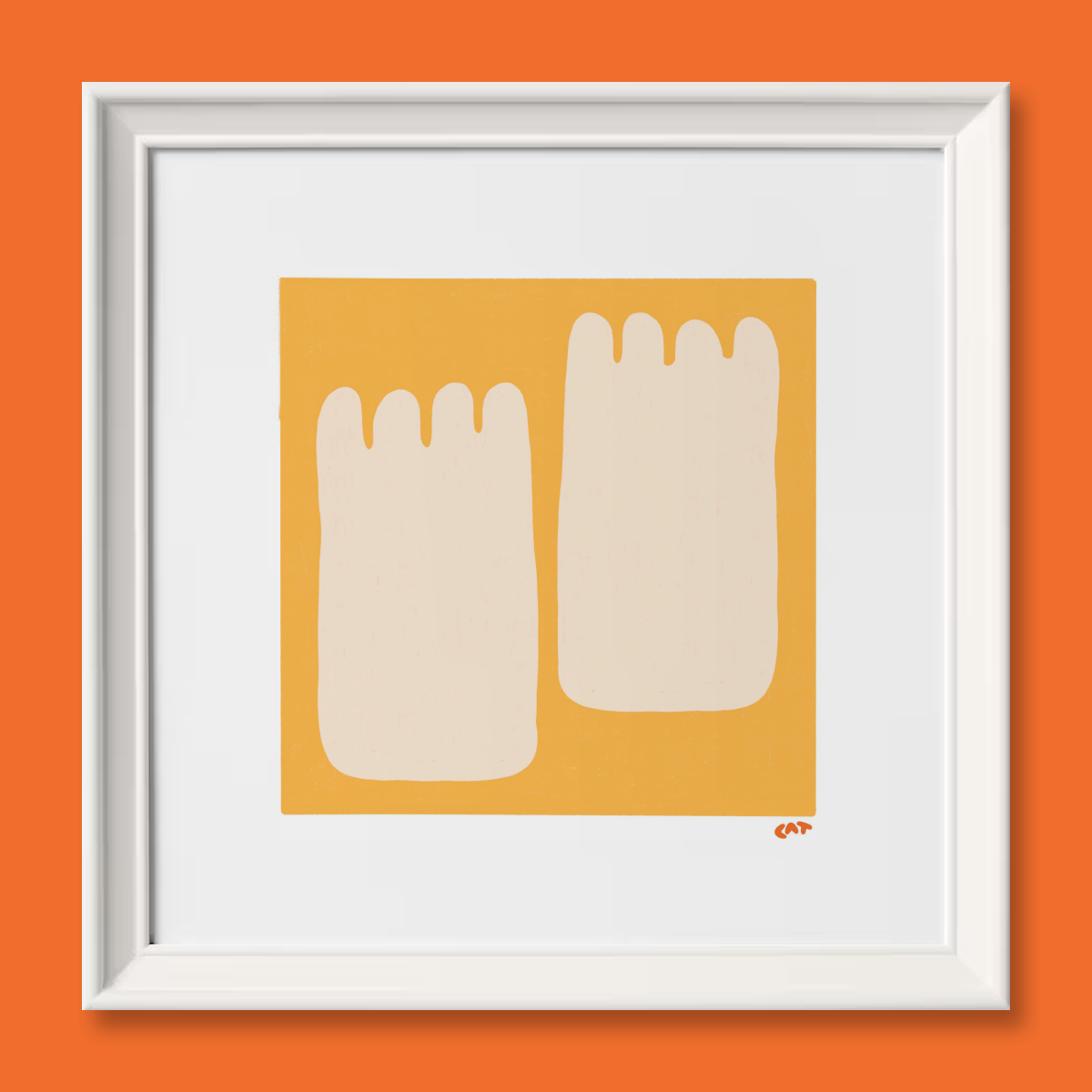White framed print of a yellow square with two beige foot-shaped objects.
