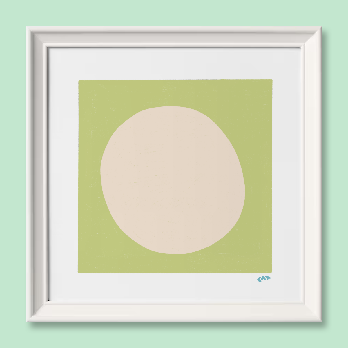 White framed print of a beige dot on top of a green square.
