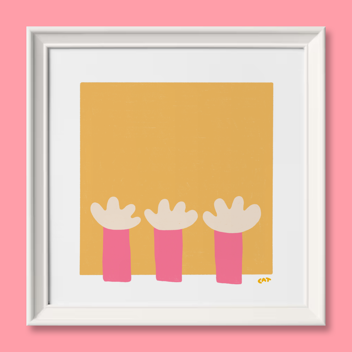 White framed print of a yellow square with pink and white flower like objects.
